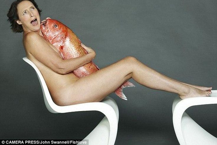 Fiona Shaw clutching a large ruby snappe