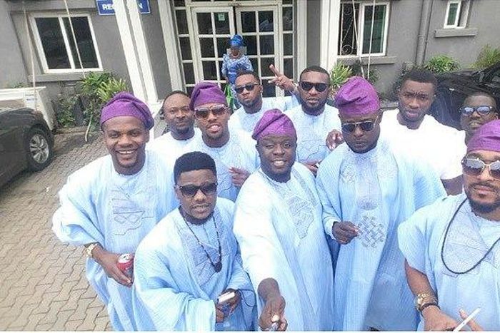 Groomsmen in their light blue Yoruba attire ready to support Gbenro Ajibade as he weds his lover, Osas Ighodaro