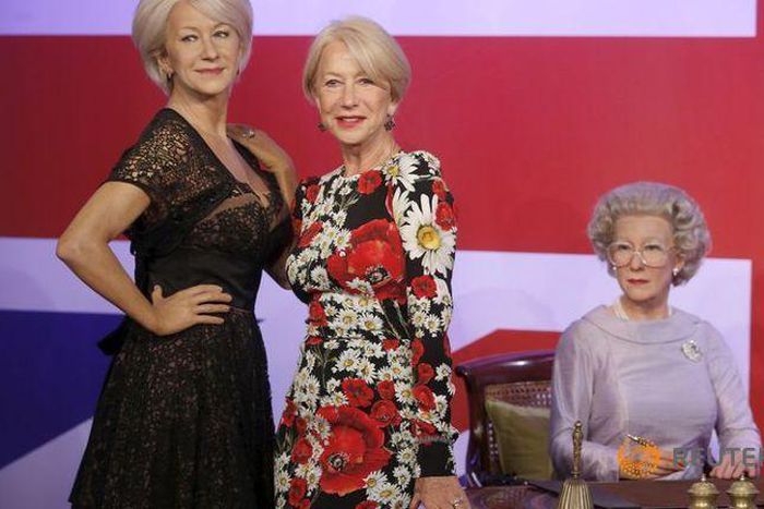 "Spot the fake!" Mirren meets herself in triplicate wax works