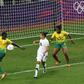 New Zealand's Sarah Gregorius watches as Cameroon's Ysis Sonkeng scores an own goal during their women's football first round Group E match at the City of Coventry Stadium during the London 2012 Olympic Games