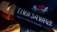 Tiwa Savage's gold microphone