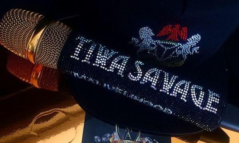 Tiwa Savage's gold microphone