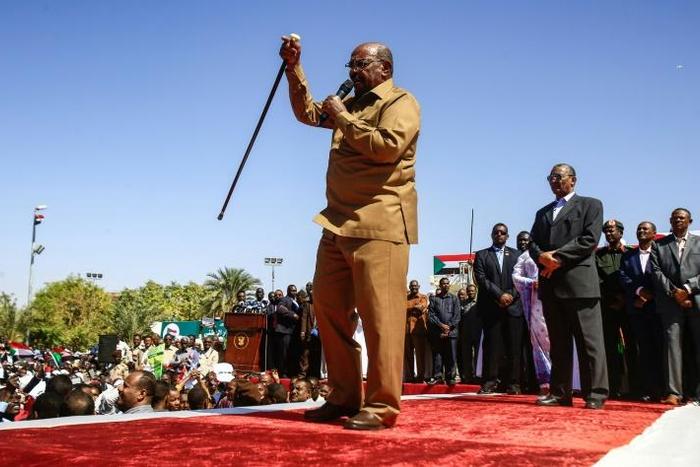 Sudan's President Omar al-Bashir speaks during a rally with his supporters in the capital Khartoum on January 9, 2019