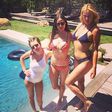Demi Moore looking stunning in her bikini flanked by daughters