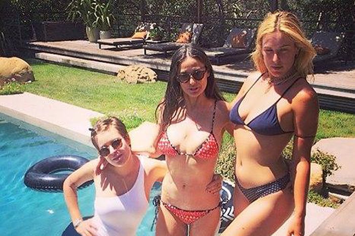 Demi Moore looking stunning in her bikini flanked by daughters