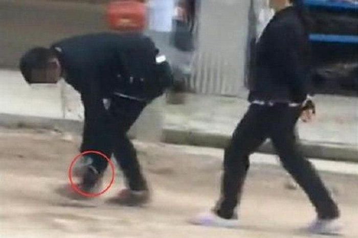 A mother putting her son in place