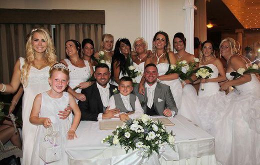 Grooms Deri Rogers and Ben Wood had their ten bridesmaids all dressed up in big white gowns
