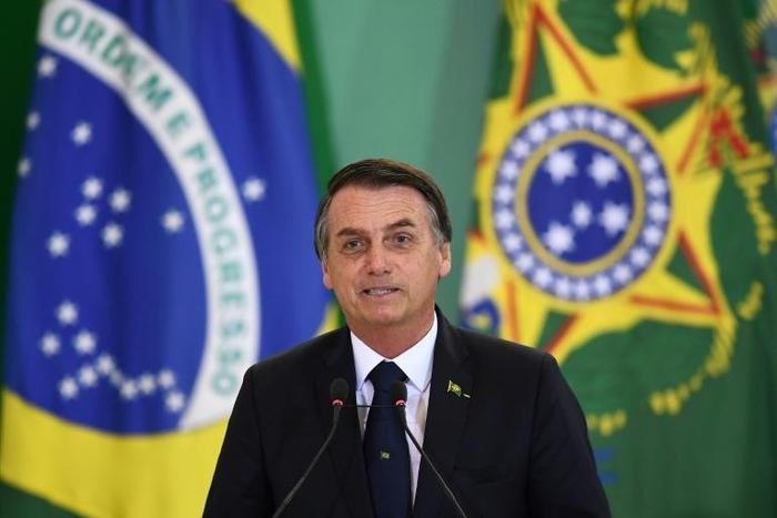 Brazilian President Jair Bolsonaro delivers a speech during the appointment ceremony of the new heads of public banks, at Planalto Palace in Brasilia on January 7, 2019
