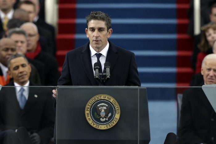 Poet Richard Blanco speaks at the U.S. Capitol in Washington during the inauguration for President Barack Obama, left, and Vice President Joe Biden right.