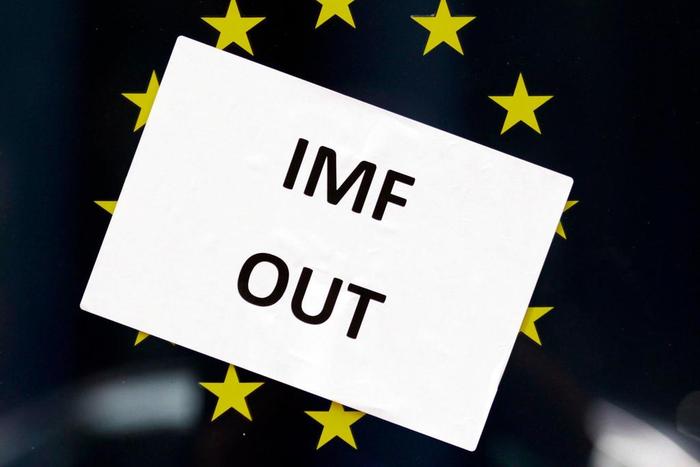 Anti-IMF poster on a window in Dblin.