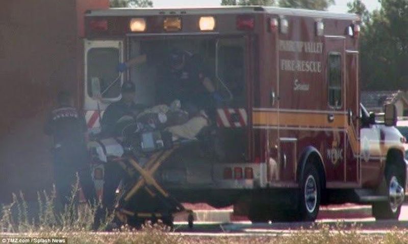 Photos of an unconscious Lamar Odom as he was being transported in an ambulance