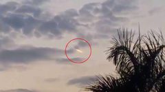 This family were stunned when they saw an alien flying in the skies above their home.