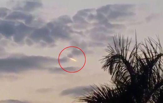 This family were stunned when they saw an alien flying in the skies above their home.
