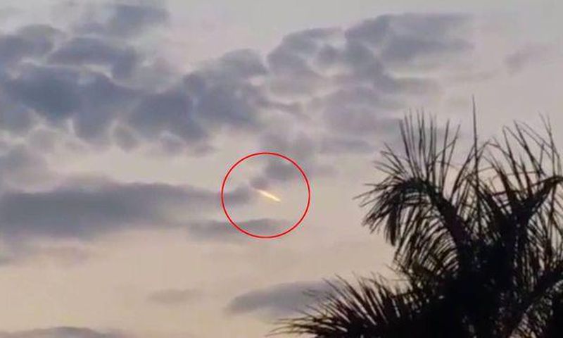 This family were stunned when they saw an alien flying in the skies above their home.