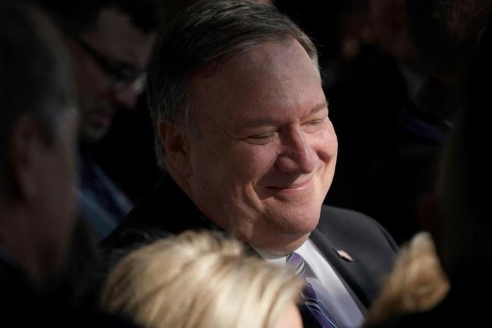 US Secretary of State Mike Pompeo listens as President Donald Trump speaks about the government shutdown at the White House