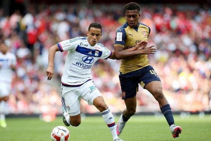 Lyon's Mehdi Zeffane in action with Arsenal's Alex Iwobi Reuters / Paul Hackett Livepic