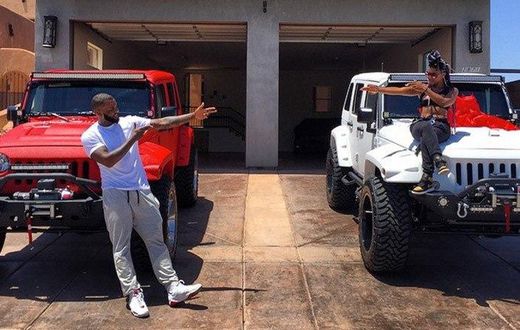 The Game and his personal assistant, LoLo enjoying her birthday after getting the gift