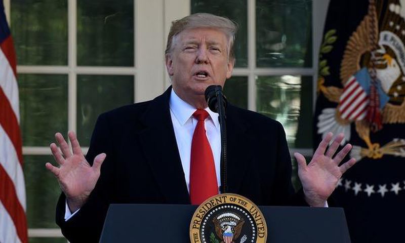 Government reopens as Trump casts doubt on prospects for a border wall deal