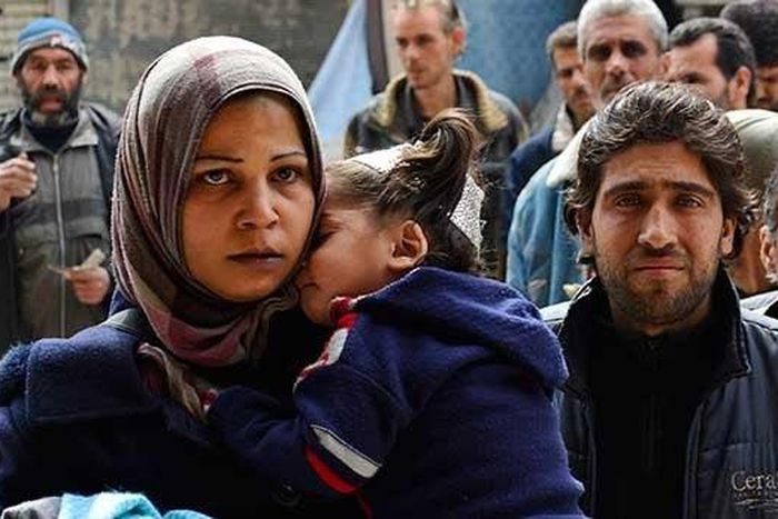 Short of cash, U.N. cuts Syria refugees' rations again