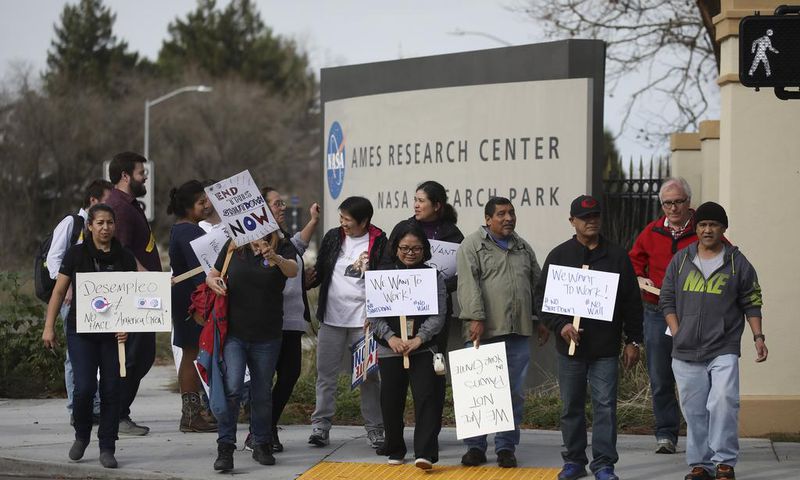 They Build Spacecraft and Fight Epidemics for America. The Shutdown May Scare Them Away.