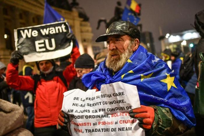 Hundreds demonstrated against the Romanian government outside the concert hall where the ceremony was held