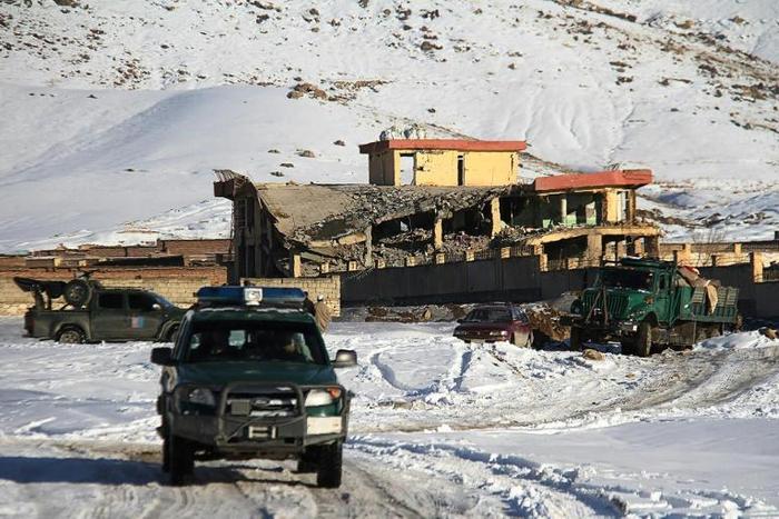Militants detonated a vehicle packed with explosives at the training facility before gunmen arrived in a car and opened fire