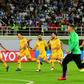 Australia's players celebrate their shoot out victory over Uzbekistan