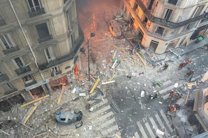 A woman's body has been found under the rubble following Saturday's massive blast in Paris, which also killed two firefighters and a Spanish tourist