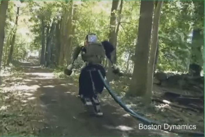 The Atlas humanoid robot taking a walk in the forest