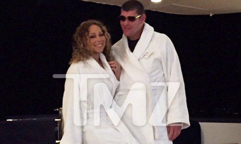 Mariah Carey and James Packer wearing matching white robe in Itlay