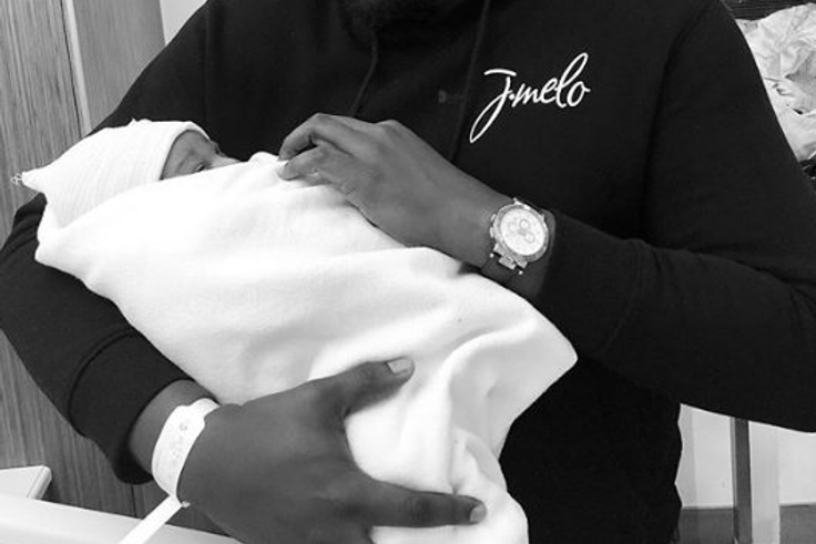 John Dumelo with his baby