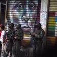 Soldiers stand guard near the presidential palace in Caracas on August 4, 2018, after the government said drones loaded with explosives detonated near President Nicolas Maduro during a military ceremony