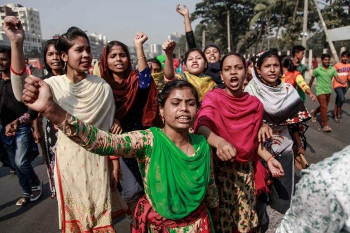 Thousands of garment workers are on strike to demand higher wages
