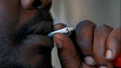 ___3926955___https:______static.pulse.com.gh___webservice___escenic___binary___3926955___2015___7___1___13___Black-Man-Smoking-460x250