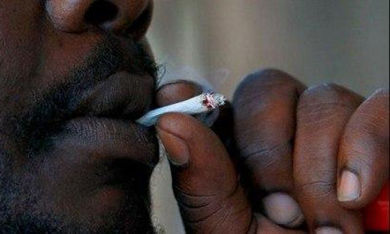 ___3926955___https:______static.pulse.com.gh___webservice___escenic___binary___3926955___2015___7___1___13___Black-Man-Smoking-460x250