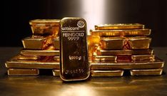 Gold bars are stacked in the safe deposit boxes room of the Pro Aurum gold house in Munich March 3, 2014. REUTERS/Michael Dalder
