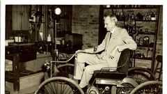 Henry Ford, Founder of the Ford Motor Company, with one of the earliest versions of the modern day car