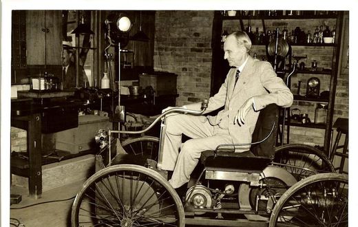 Henry Ford, Founder of the Ford Motor Company, with one of the earliest versions of the modern day car