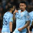 Cloud nine: Gabriel Jesus (2nd left) scored four of Manchester City's goals in a 9-0 thrashing of Burton Albion on Wednesday