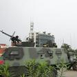 Soldiers guard the headquarters of Gabon's state radio and television after the foiled coup