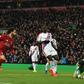 Mohamed Salah celebrates after scoring his first goal