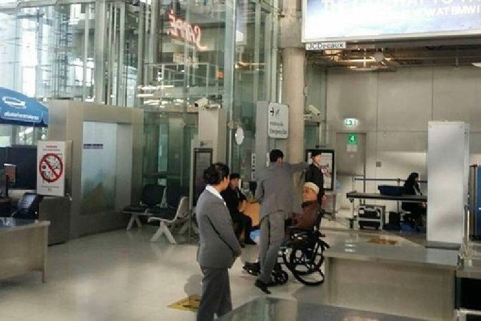 Aziz Phitakkumpon, the Sheikh-ul Islam of Thailand sat calmly on the wheel chair, while his turban was being searched by an Airport security staff.