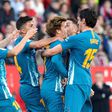 Antoine Griezmann crashed home a free-kick to keep Atletico Madrid second in La Liga