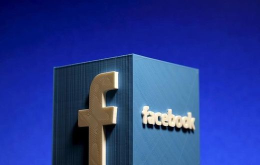 A 3D plastic representation of the Facebook logo is seen in this illustration in Zenica, Bosnia and Herzegovina, May 13, 2015.   REUTERS/Dado Ruvic