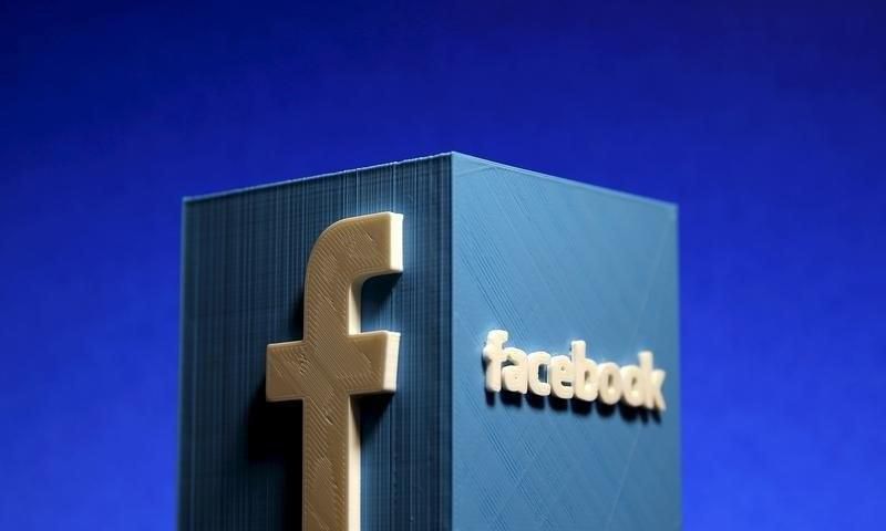 A 3D plastic representation of the Facebook logo is seen in this illustration in Zenica, Bosnia and Herzegovina, May 13, 2015.   REUTERS/Dado Ruvic