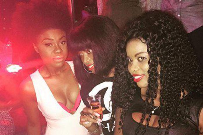 Becca shows off her boobs in a club with friends