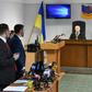 Lawyers (L) for ousted Ukrainian leader Viktor Yanukovych stand as a panel of three-judges begin to deliver the verdict of high treason against the former pro-Moscow president