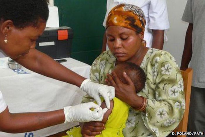 A girl in Tanzania receiving the malaria vaccine during the clinical trial