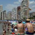 In the resort of Benidorm, pubs and English ads for mobility scooters for the elderly abound