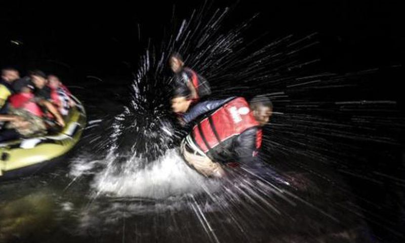 Syrian migrants are pushing away Nigerians and other African refugees  who try to board their boat to the Greek island of Kos.